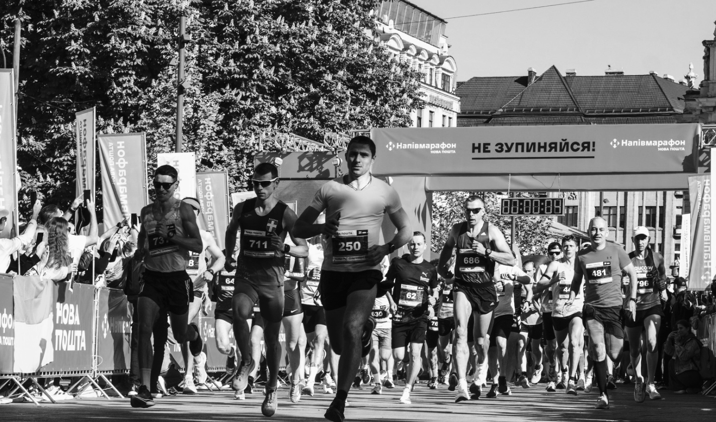 Runners cover the distance of the Nova Post half marathon in Lviv.